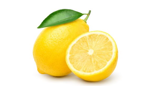 Natural Lemon fruit with cut in half and green leaf isolated on white background. Clipping path.